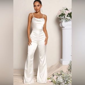 White fashion nova satin jumpsuit. Brand new with tags. Size large